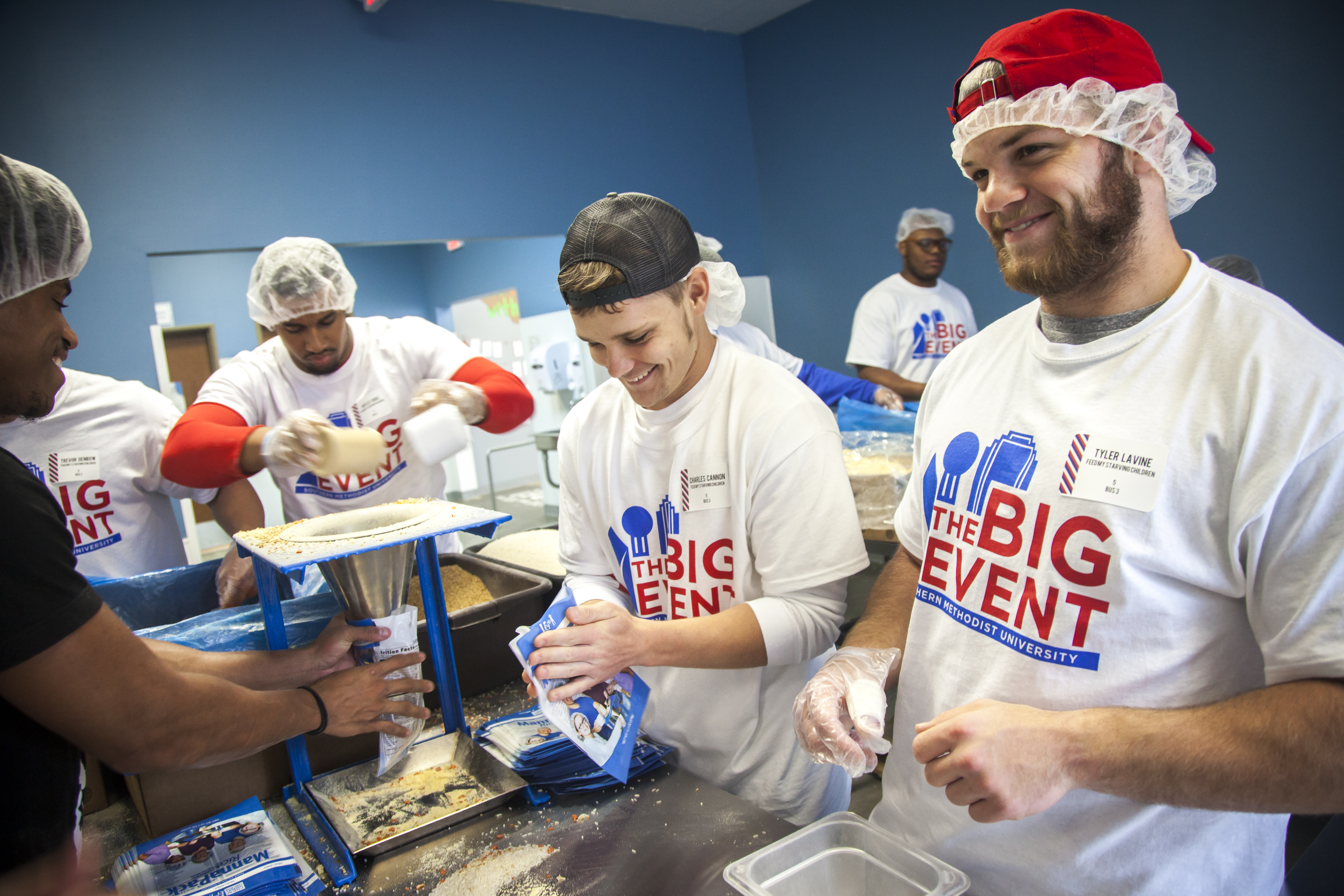 People volunteering at an event.