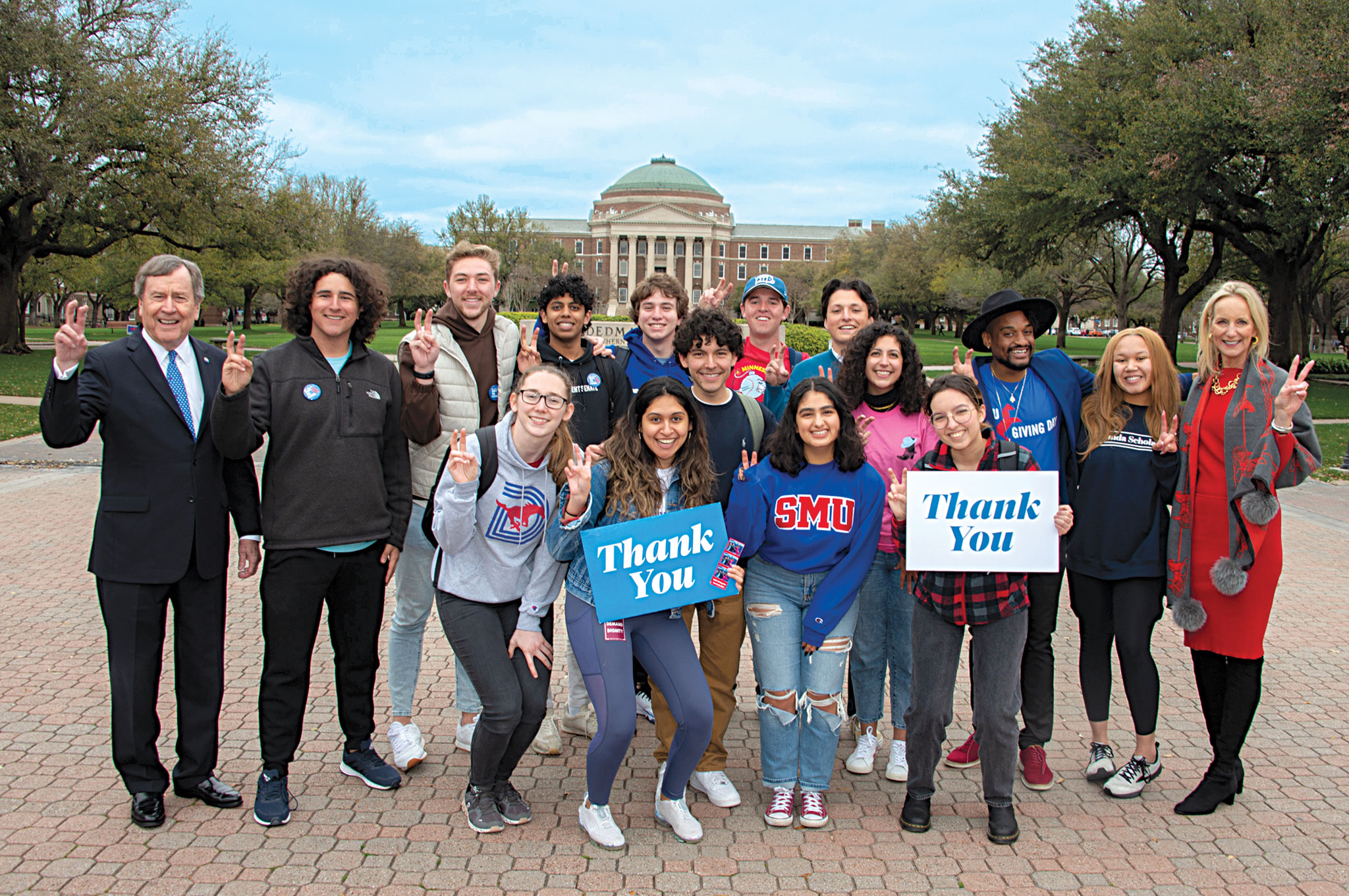 Group taking photo in front of Dallas Hall