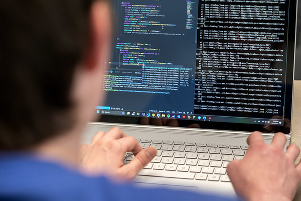 Engineering working on a computer
