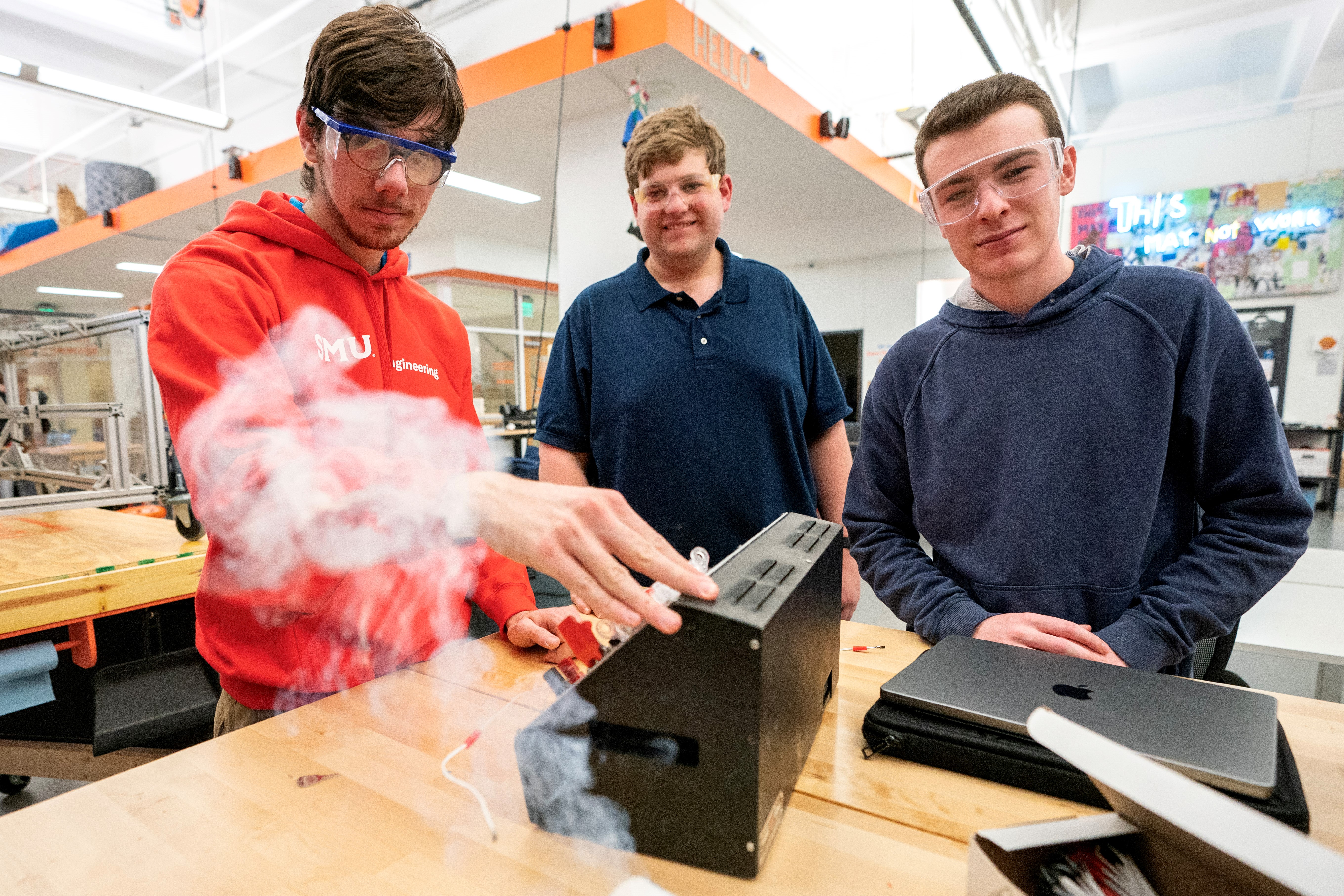 Students working with rocketry at the Deason Innovation Gym