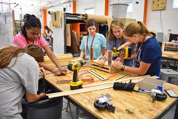 Seniors and juniors working together in the camp for Engineering Design Experience
