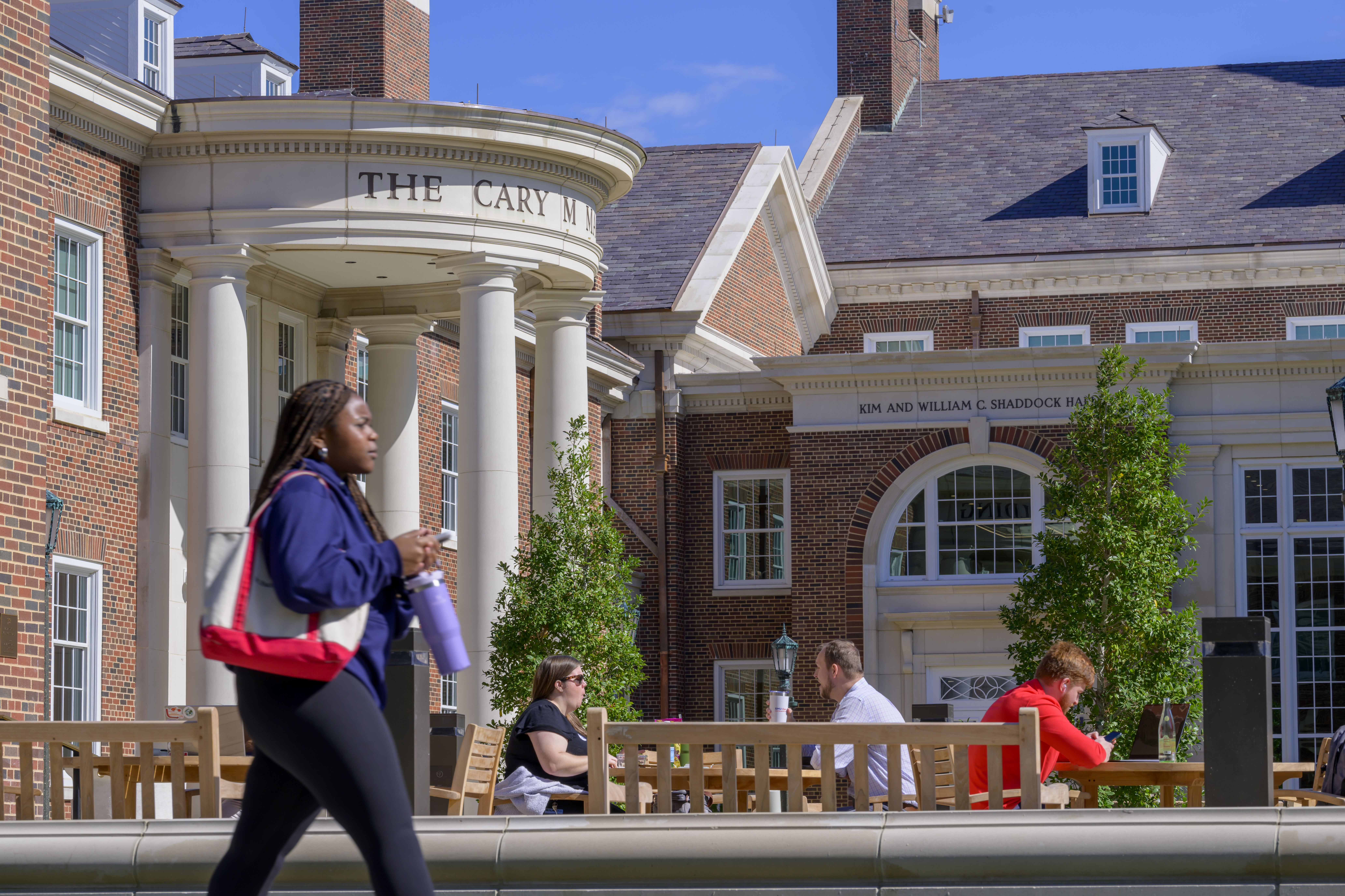 students in front of the Cox School