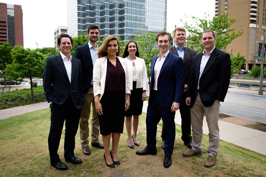 MBA Students gather outside.