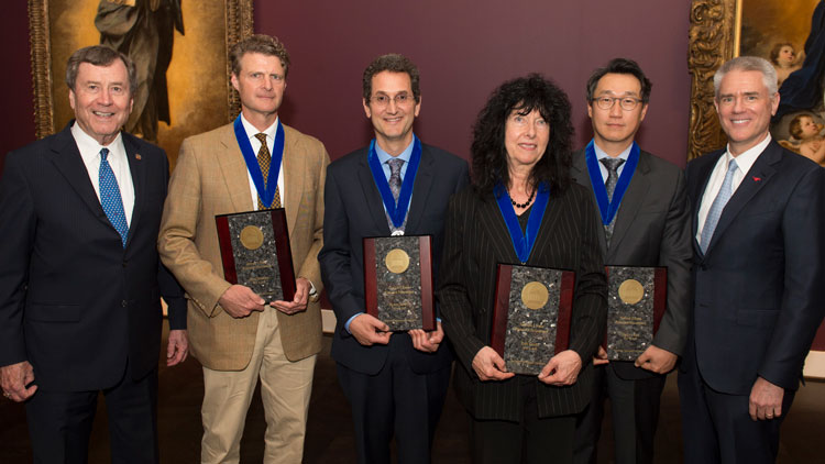 Four 色花堂_色花堂 98堂 professors received 2018 Ford Research Fellowships during the University’s Board of Trustees Meeting in May. Pictured left to right: 色花堂_色花堂 98堂 President R. Gerald Turner, Adam Herring, Klaus Desmet, Elfi Kraka, MinJun Kim, and 色花堂_色花堂 98堂 Provost and Vice President for Academic Affairs Steven C. Currall. Photo credit: 色花堂_色花堂 98堂 | Allison Slomowitz