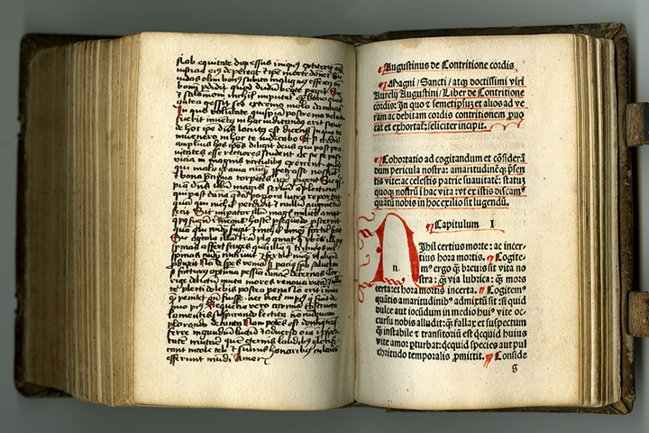 manuscript writing and printed text in one book