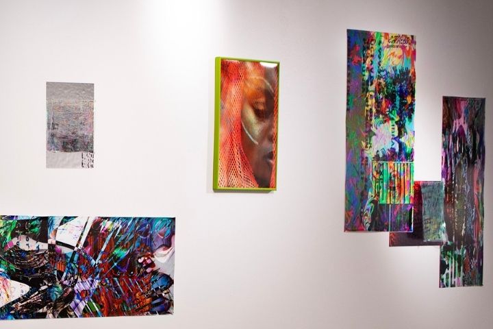Colorful art hanging on a white wall