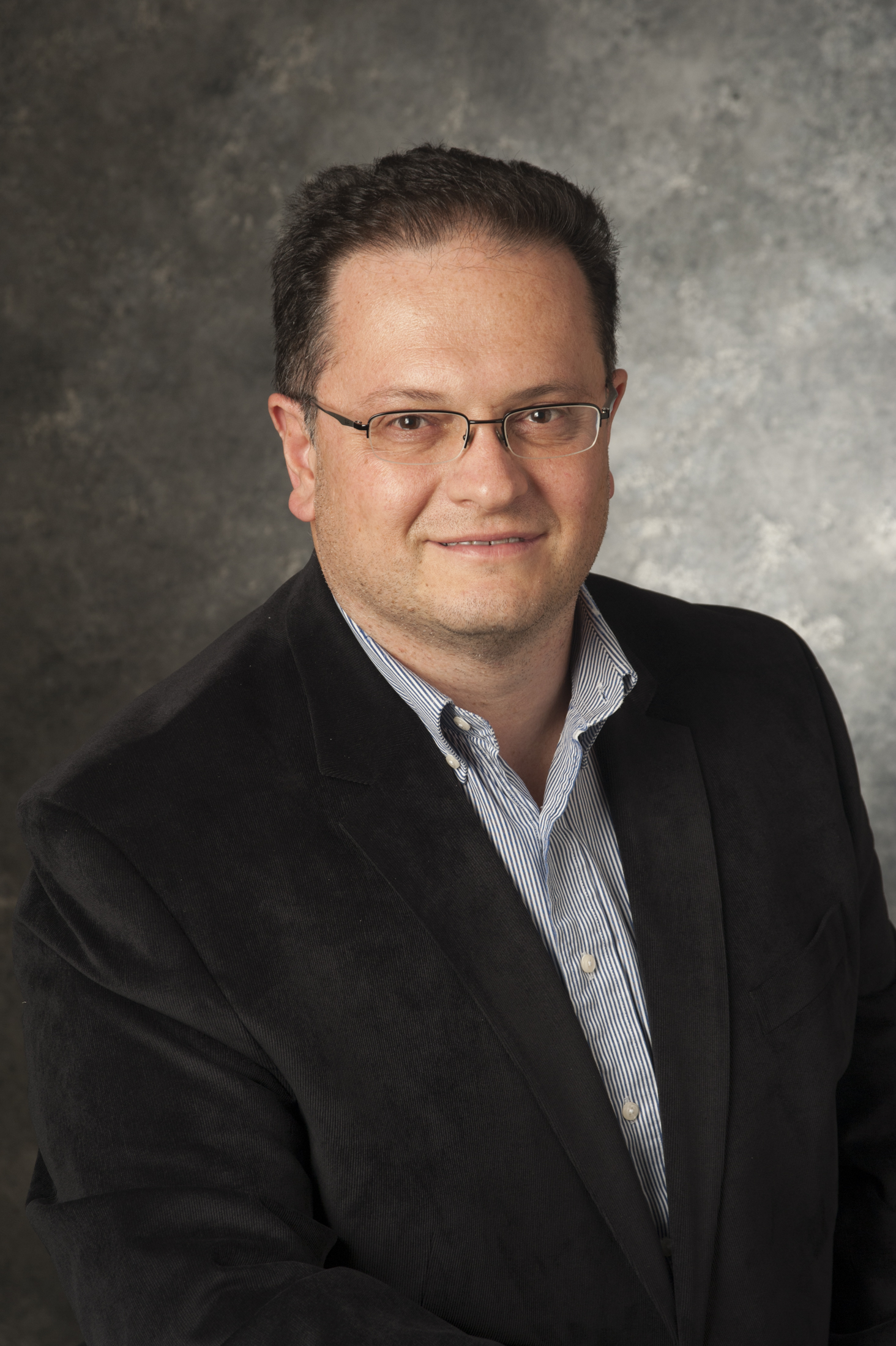 A headshot of Ali Beskok, a member of the Lyle School of Engineering Faculty.