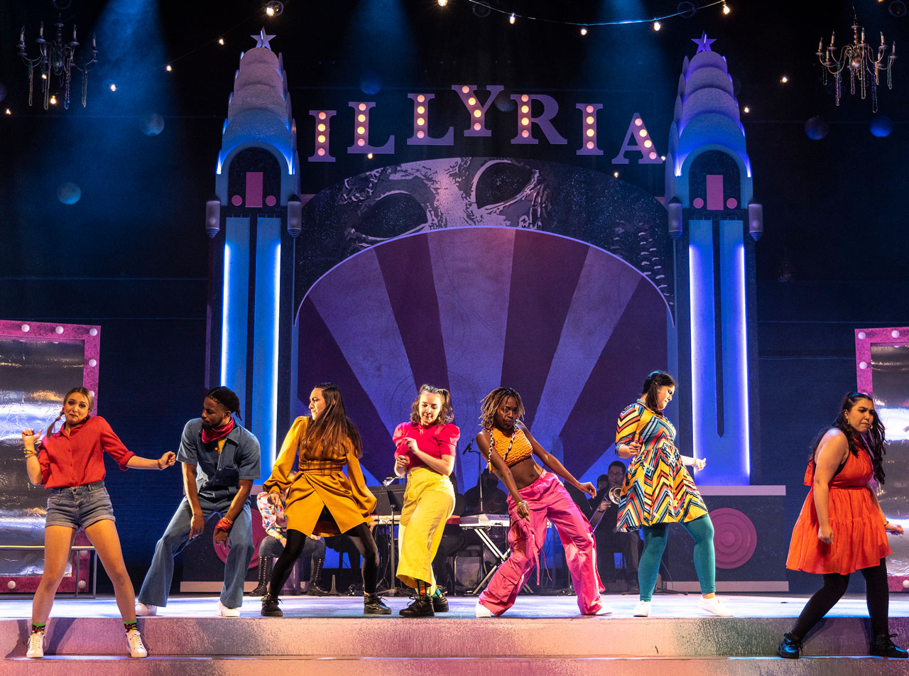 Theatre students perform a dance number during a spring play production.