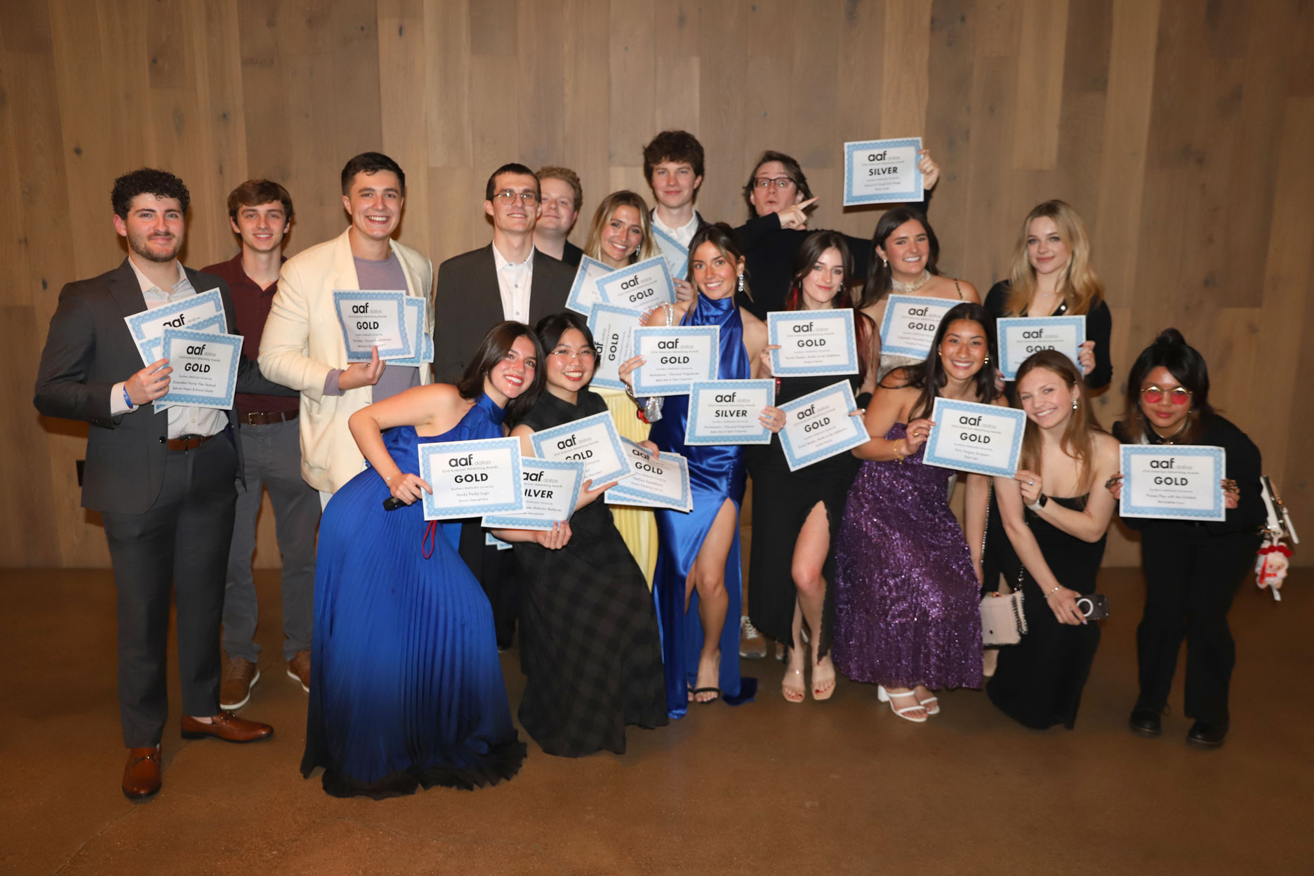Advertising students pose with their awards from the Dallas ADDYs.