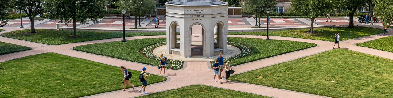 Students walking through the R. Gerald Turner Centennial Quadrangle.