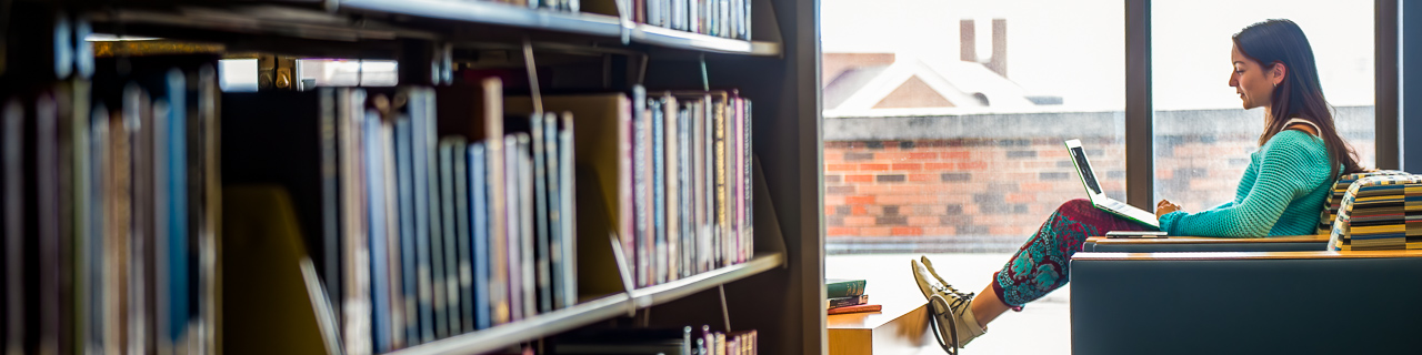 A student studies in Fondren Library Center 