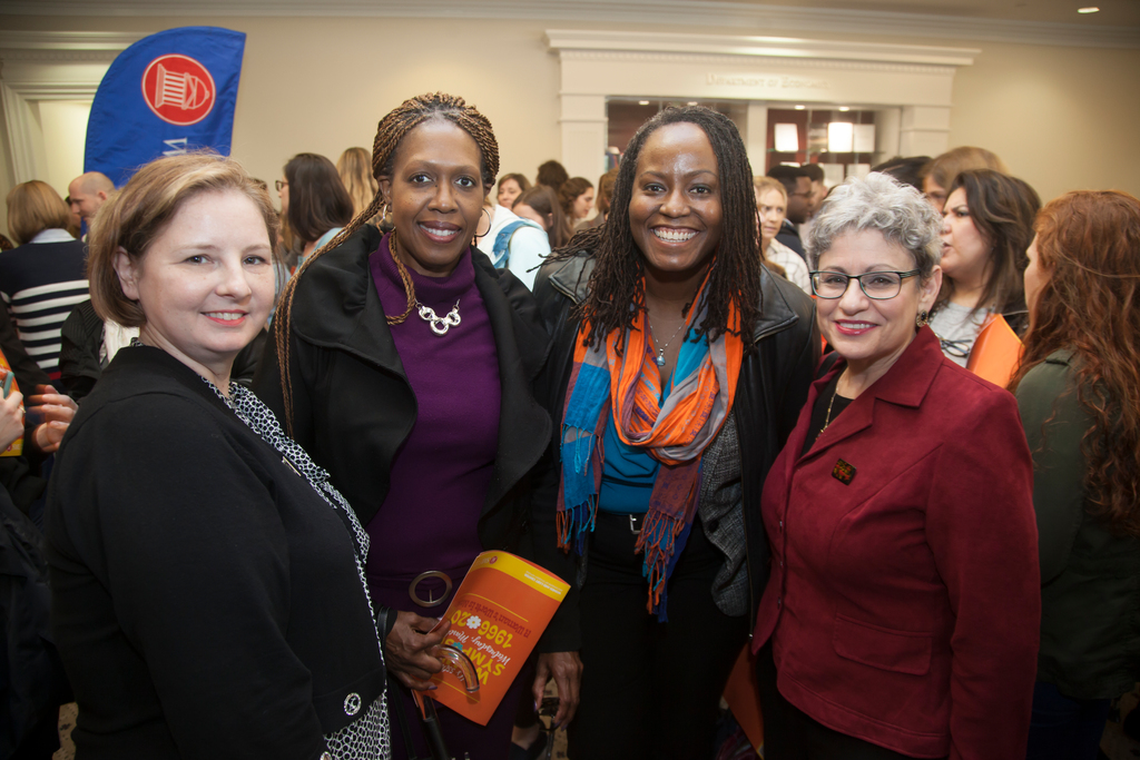 four women smiling