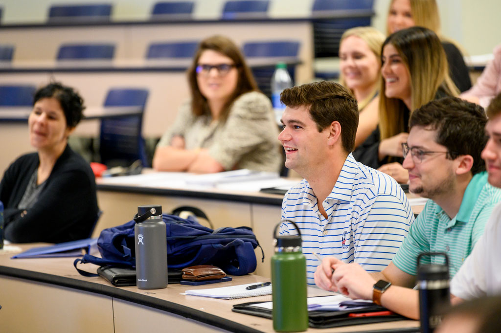 Students attending a lecture in a Southern Methodist University classroom